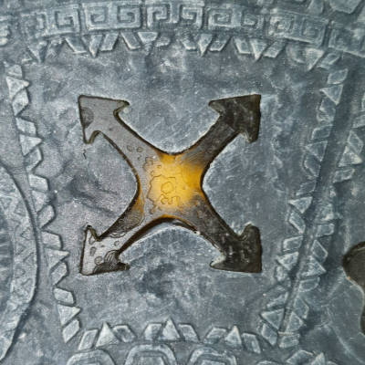 “The Center Arrows” symbol